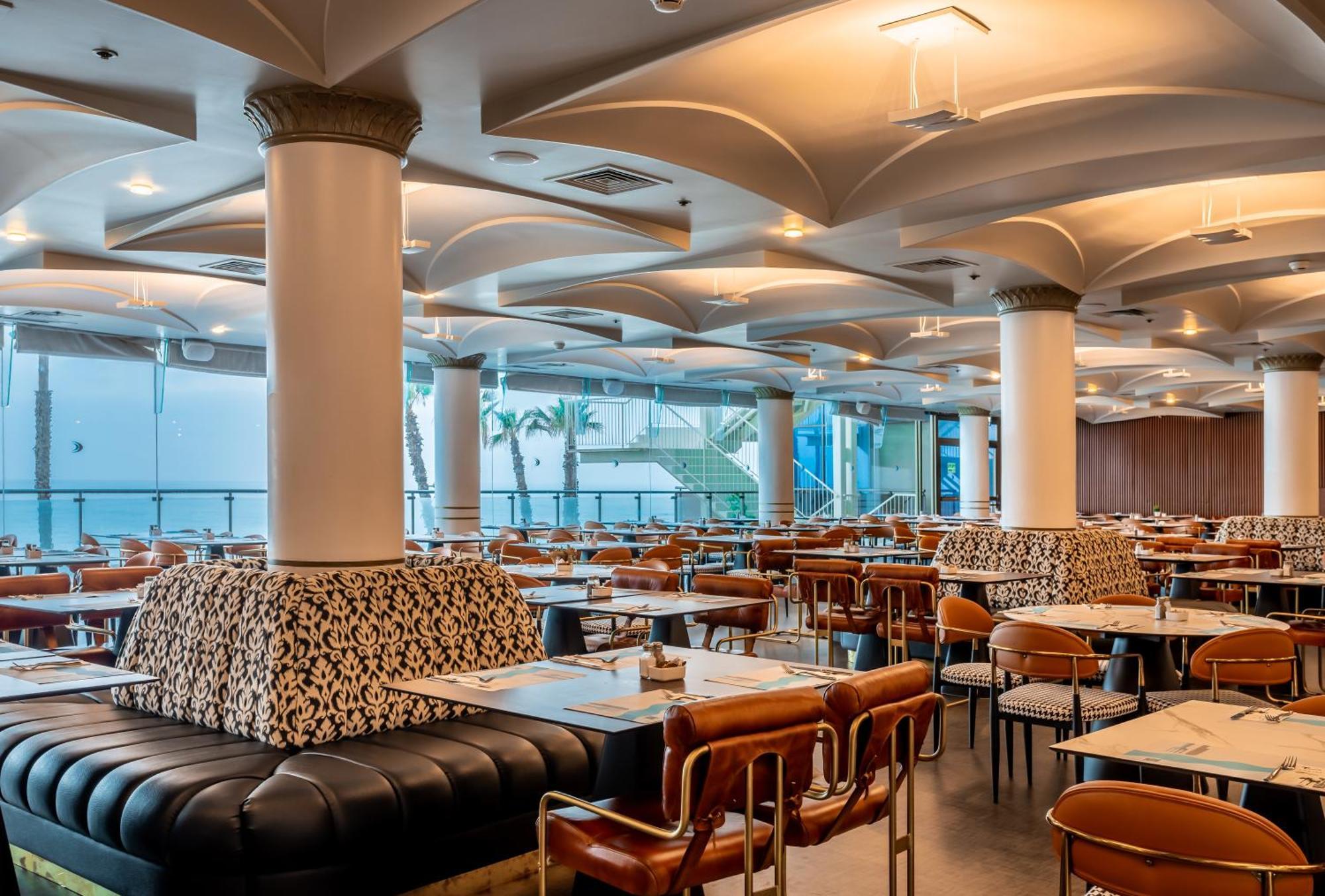 Daniel Herzliya Hotel Exterior foto The interior of the restaurant